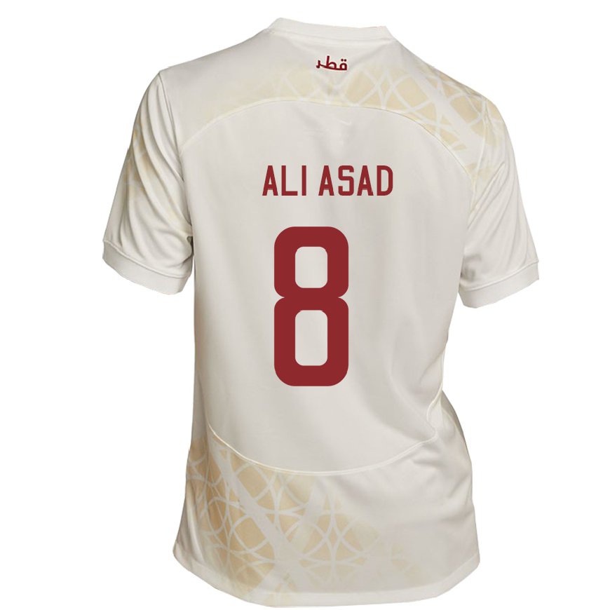 Kandiny Enfant Maillot Qatar Ali Asad #8 Beige Doré Tenues Extérieur 22-24 T-shirt