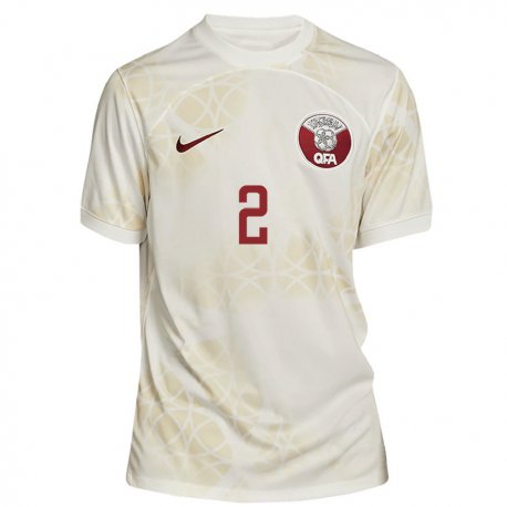 Kandiny Homme Maillot Qatar Amna Al Naimi #2 Beige Doré Tenues Extérieur 22-24 T-shirt