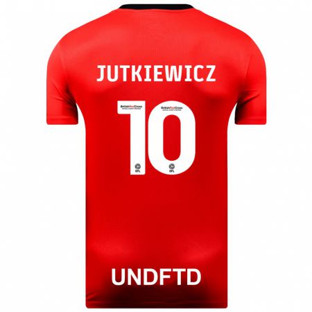 Kandiny Enfant Maillot Lukas Jutkiewicz #10 Rouge Tenues Extérieur 2023/24 T-Shirt