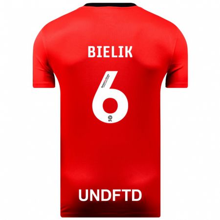 Kandiny Homme Maillot Krystian Bielik #6 Rouge Tenues Extérieur 2023/24 T-Shirt